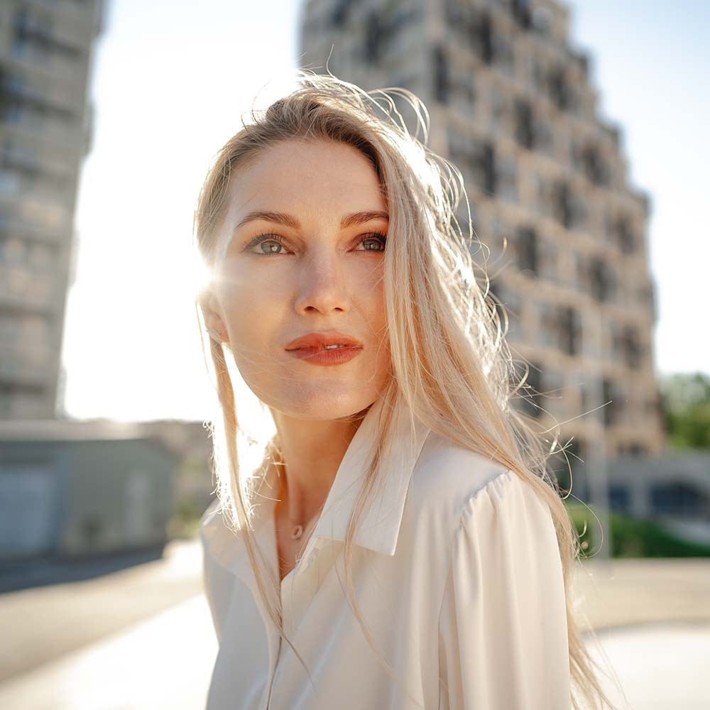 close-up-portrait-of-young-businesswoman-outdoors-5PRP7CF.jpg