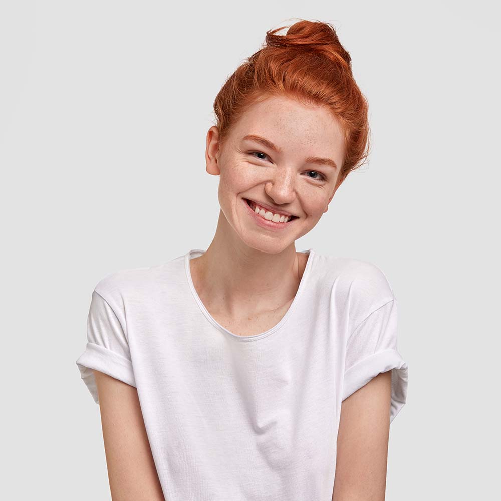 portrait-of-positive-glad-ginger-young-female-has-DFTL64Z.jpg