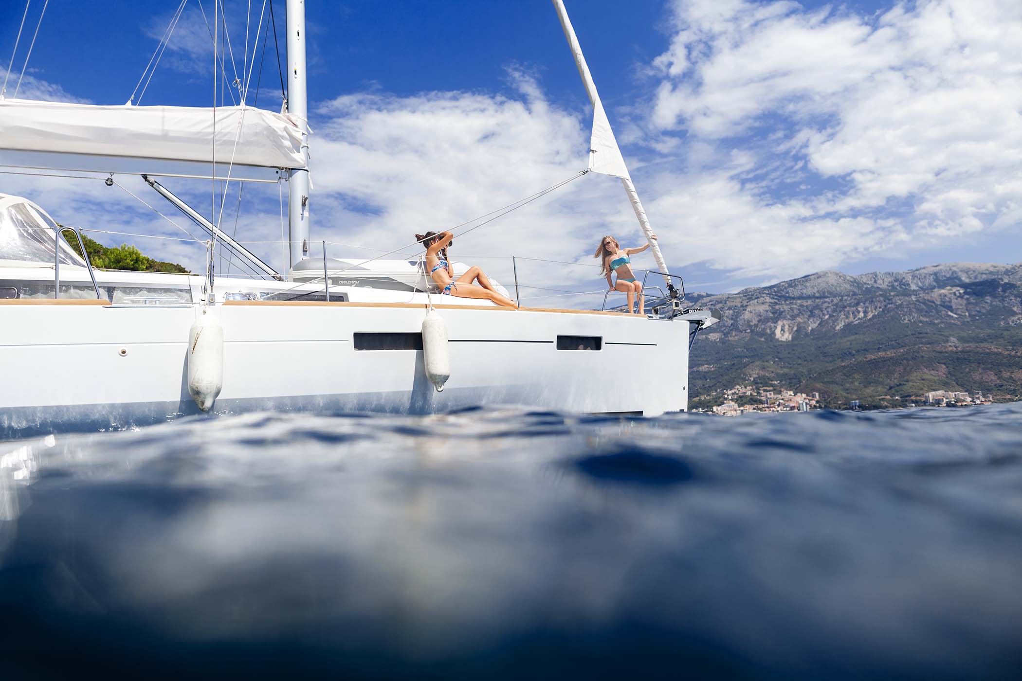 women-yachting-and-relax-on-cruise-boat-in-sea-ZN9DXYA.jpg